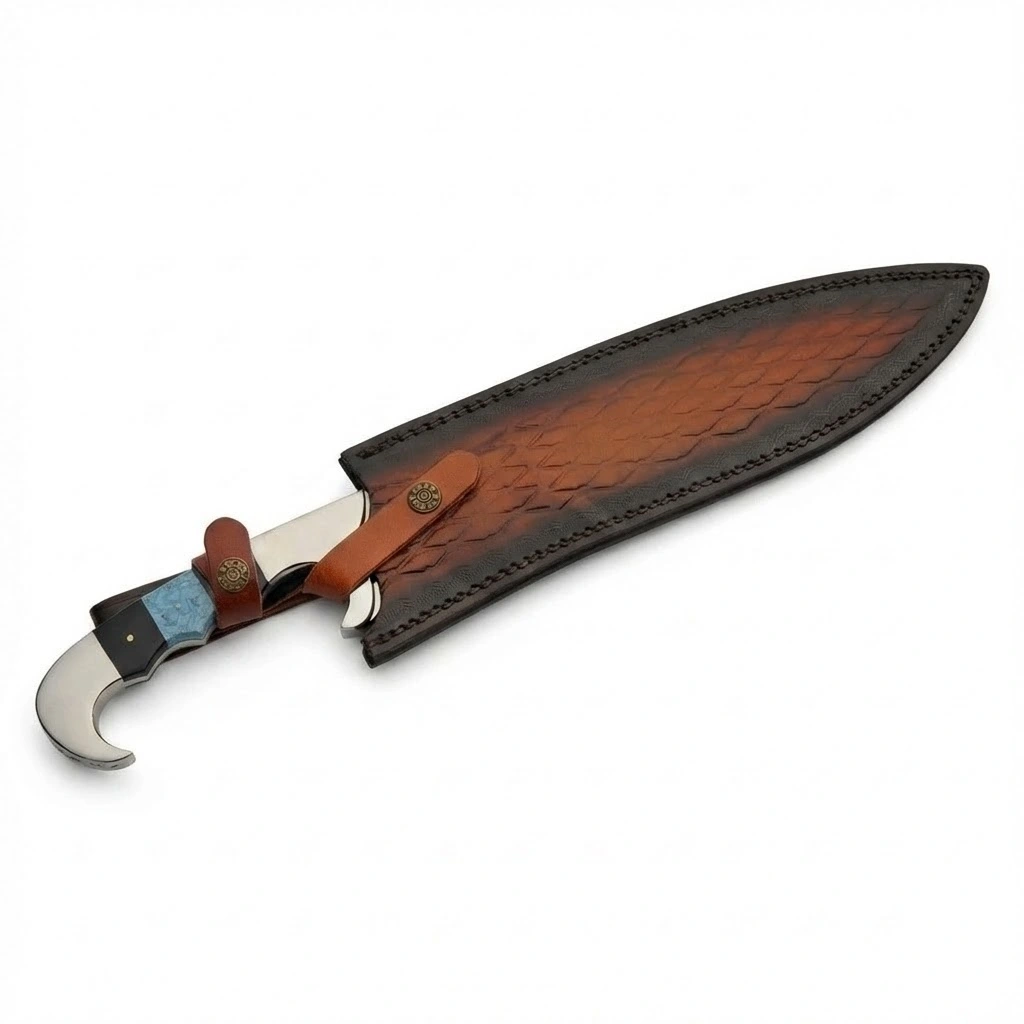 falcata-bowie-leather-sheath-pair Falcata style fixed blade knife inserted into brown leather sheath.