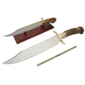 1-inch crown stag handle bowie knife with display stand.
