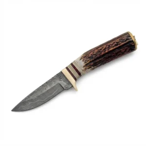Full view of Damascus steel skinner with genuine stag antler handle and brass guard.