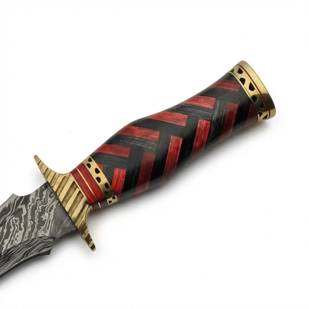 braided-dagger-damascus-steel-handle-detail. Close up of red and black braided style wood handle on Damascus dagger