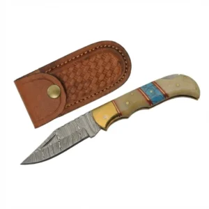 Handmade Damascus pocket knife displayed next to a brown leather sheath.
