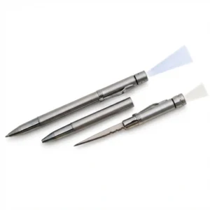 Executive pen knife in closed position featuring a discreet stainless steel body and pocket clip.