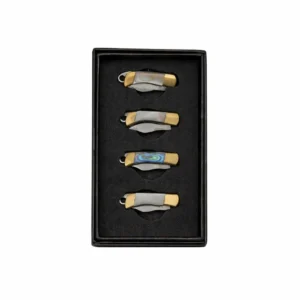 Close up of iridescent Mother of Pearl handle scales and brass bolsters