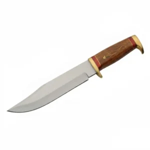 Classic Bowie style hunting knife featuring a dark wood handle with decorative brass floral inlay and guard.