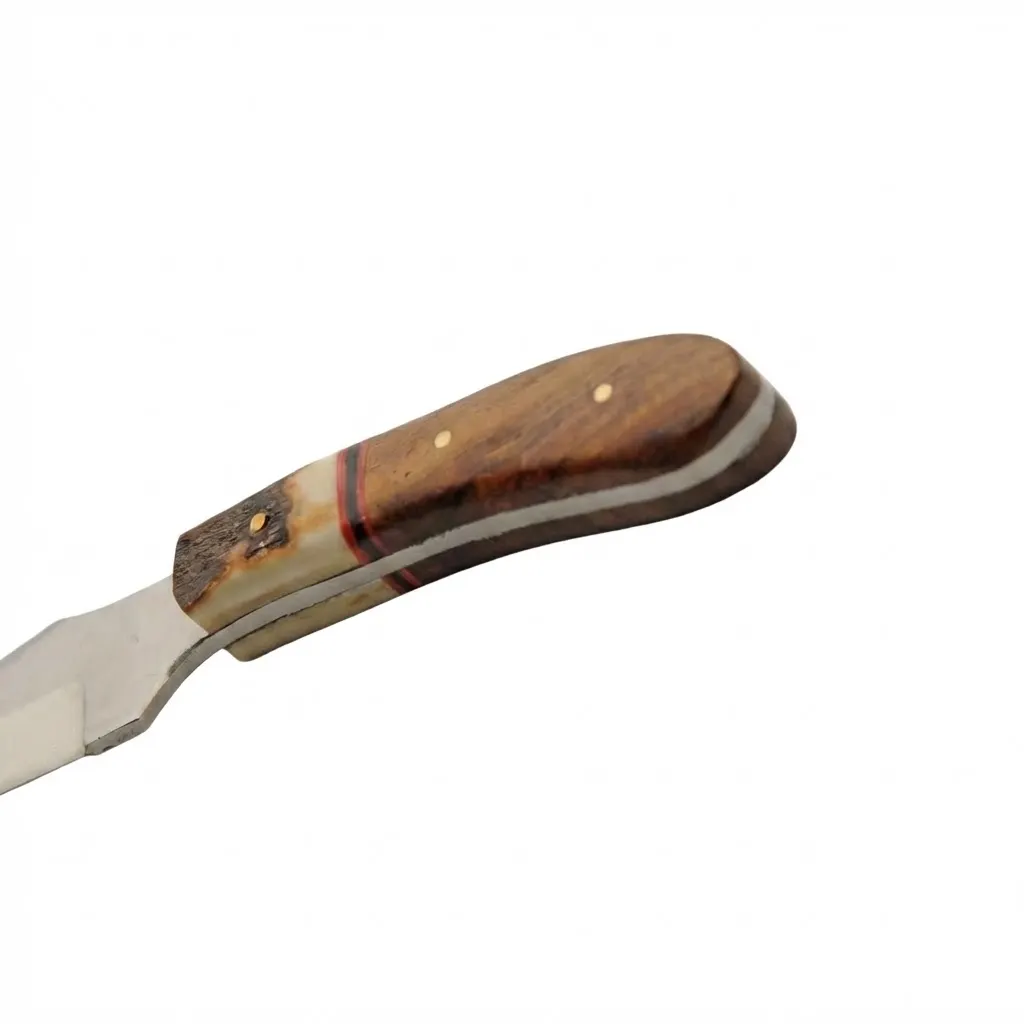 stag-bone-wood-knife-handle-spacers-spine Top down view of stag bone and wood knife handle showing brass pins and decorative spacers.