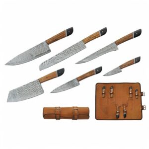 Six Damascus steel kitchen knives with wooden handles arranged around a brown leather storage roll.