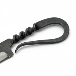 Close up of the blacksmith-twisted metal handle on a specialty knife.