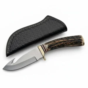 8.5 inch stag horn skinner with guthook and leather sheath.