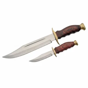 Close up of stainless steel blades and brass bolsters on a hunting knife set.