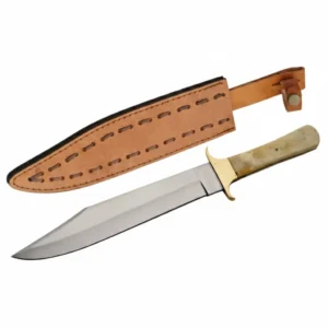 Kentucky bone handle with bowie knife and brass guard next to leather sheath.