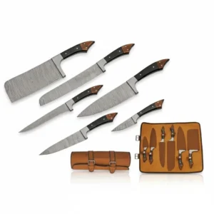 Complete 6 piece Damascus steel kitchen knife set displayed with a brown leather storage roll and blade guards.