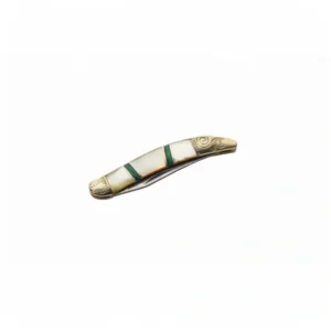 Closed Mother of Pearl folding toothpick knife with green spacers.