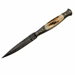 Close-up of the needle-point blade on a damascus steel slim dagger.