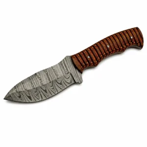 Close up of the forged steel pattern on a Pakkawood Damascus hunting knife.