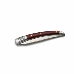 Detail of pakkawood handle and stainless steel bolsters on folding knife.