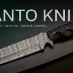 Tanto knife with Damascus steel blade and textured black handle on dark background – tactical fixed blade knife designed for hard use, tip strength, and outdoor survival.